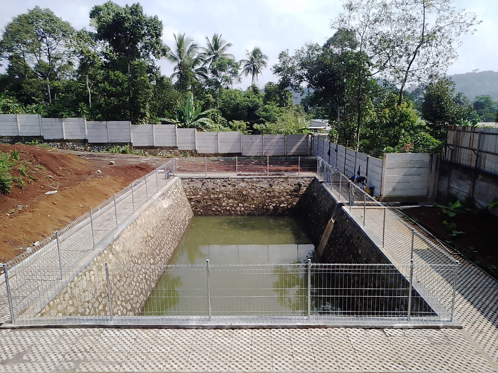 PEMBUATAN KOLAM RESAPAN KAPASITAS 800 M3